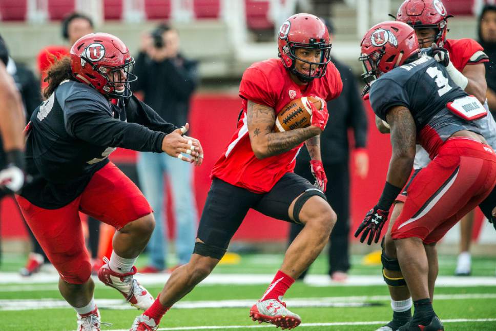 Chris Detrick  |  The Salt Lake Tribune
Utah Utes wide receiver Raelon Singleton (11) runs the ball during a scrimmage at Rice-Eccles Stadium Friday March 31, 2017.