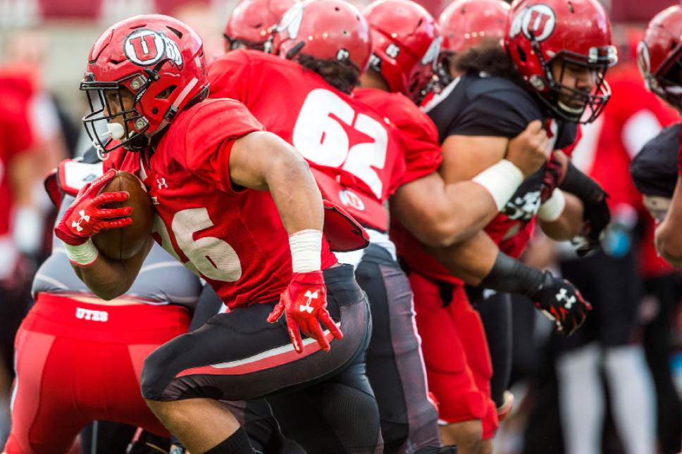 Chris Detrick  |  The Salt Lake Tribune
Utah Utes Jordan Howard (26) runs the ball during a scrimmage at Rice-Eccles Stadium Friday March 31, 2017.