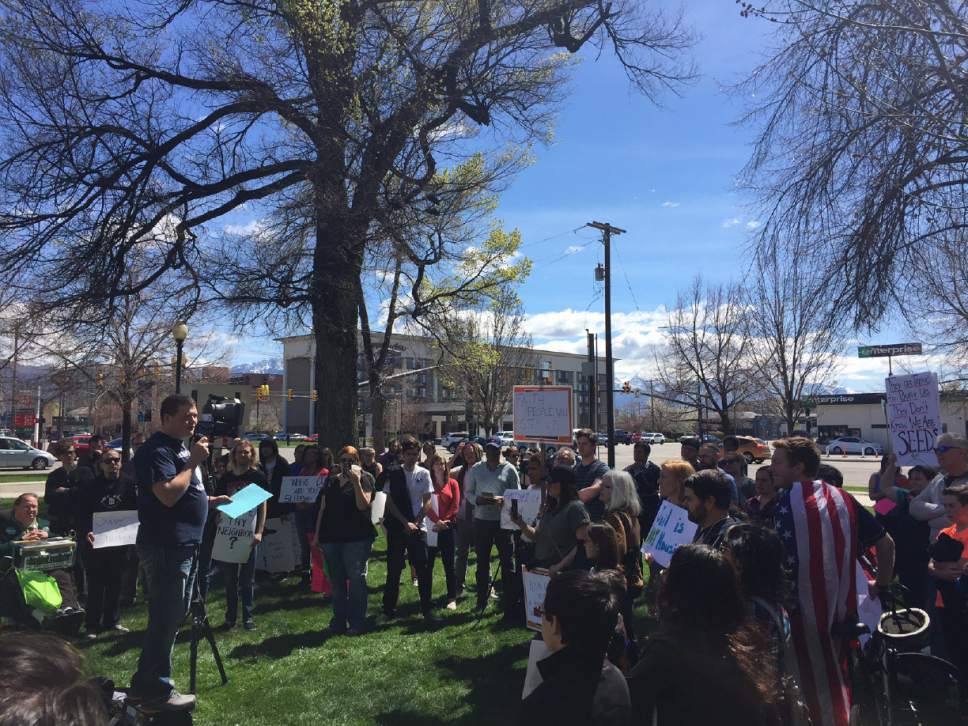 Josh Haas, a social work student at Utah State University, speaks to the crowd Saturday at a Pioneer Park demonstration backing Utah's homes population.

Luke Ramseth | Salt Lake Tribune