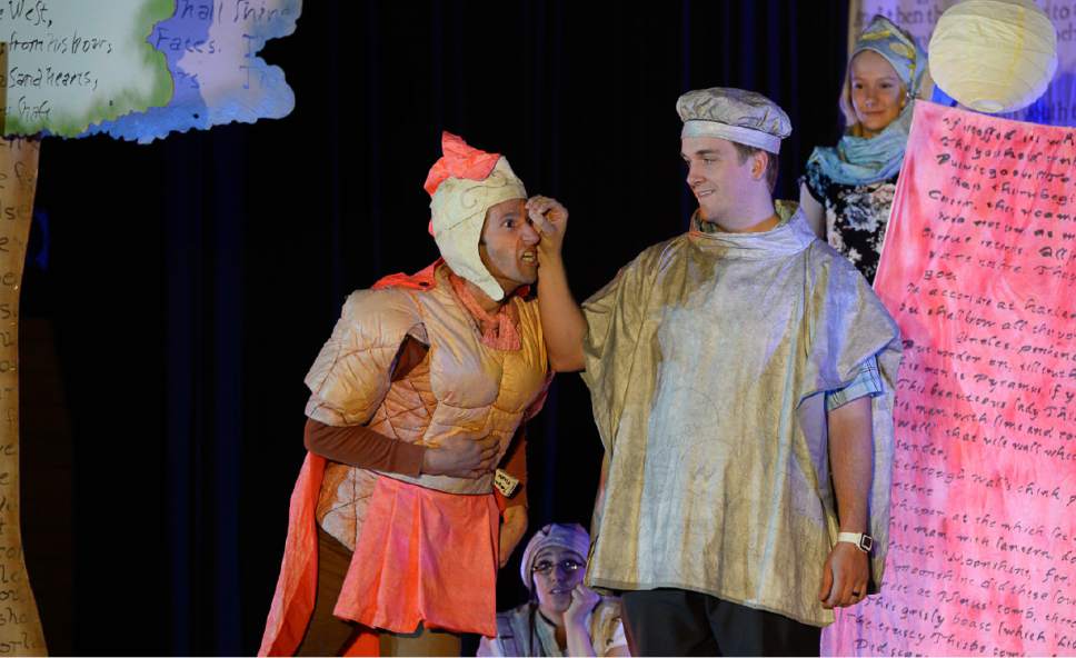 Francisco Kjolseth | The Salt Lake Tribune
Utah Shakespeare Festival's educational tour production of "A Midsummer's Night Dream" lands at Farmington Jr. recently as math teacher Kyle King and student Shayla Adams join actor Alexis Baigue onstage for the fun.