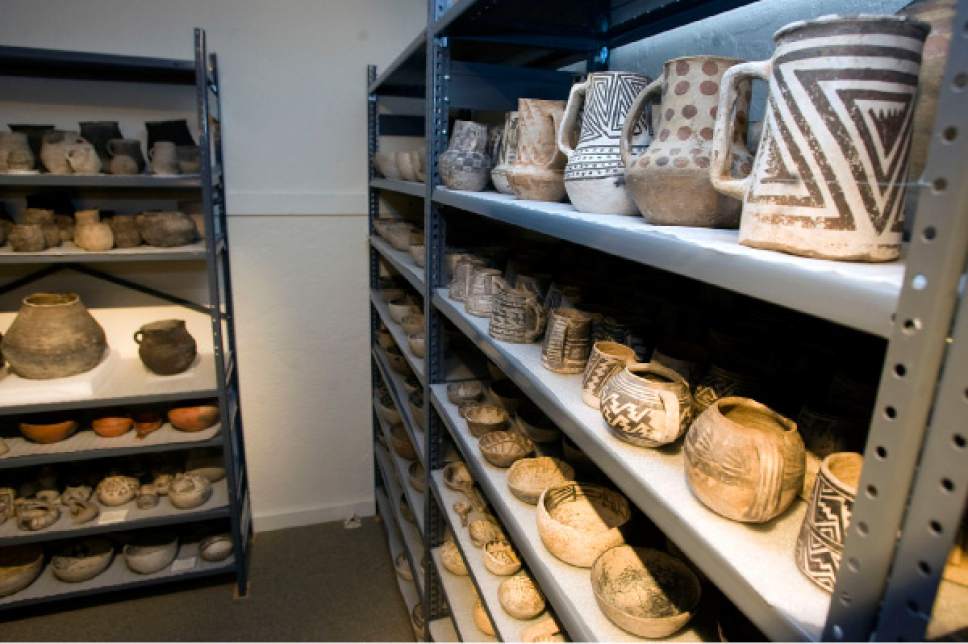 Al Hartmann  |  The Salt Lake Tribune

Some of the 900 Anasazi pots line several large racks at the Edge of the Cedars State Park Museum west of Blanding on June 12, 2009. The 900 pots are part of the Shumway, Holliday and Perkins collection sold to the Utah Navajo Trust Fund, which is considering donating donating them to the museum.