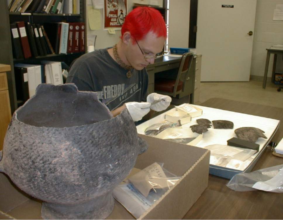 |  Tribune File photo

Archaeologist and assistant museum curator Erik Ferland catalogs non-funerary artifacts at the Edge of the Cedars State Park repository for archaeological material at Blanding.