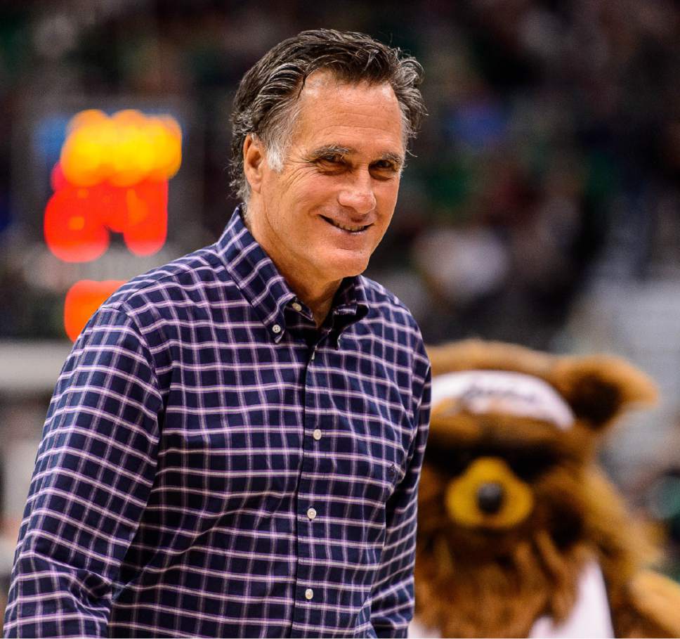 Trent Nelson  |  The Salt Lake Tribune
Mitt Romney signed balls for fans as the Utah Jazz host the Sacramento Kings at Vivint Smart Home Arena in Salt Lake City, Wednesday December 21, 2016.