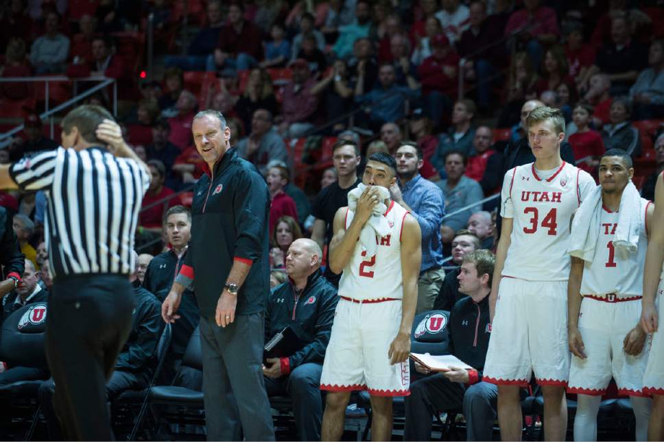 Lennie Mahler  |  The Salt Lake Tribune

Utah head coach Larry Krystkowiak and Sedrick Barefield look at an official in disbelief after an offensive foul call during a game between Utah and Washington State at the Huntsman Center in Salt Lake City, Thursday, Feb. 9, 2017.