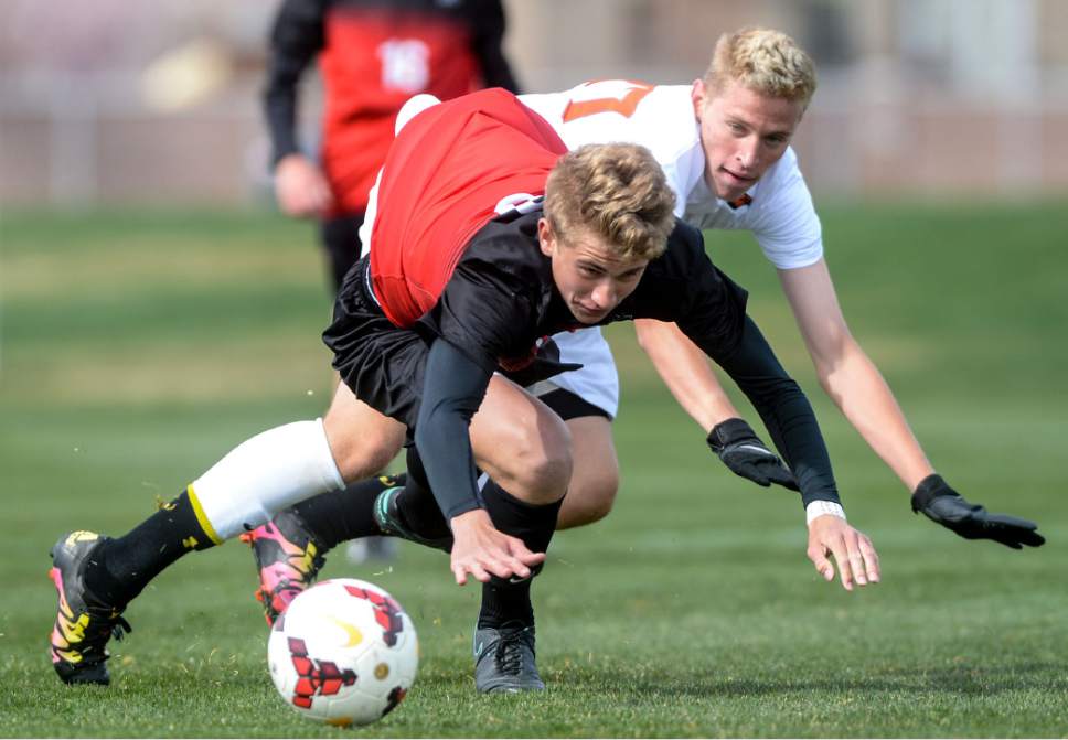 Steve Griffin  |  The Salt Lake Tribune


Alta's, Ethan Bell, front, and Skyridge midfielder Dalton Gibson crash tot he ground during game at Skyridge High School in Lehi Friday March 31, 2017.