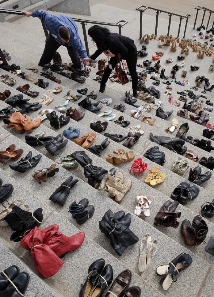 Francisco Kjolseth | Tribune file photo
The Utah Capitol steps were covered with 600 pairs of shoes in February , representing the lives lost to suicide in 2016. With teen suicide rates rising, the Centers for Disease Control and Utah Department of Health support collecting data on sexual orientation among Utah high schools students, but key school districts have blocked the move, deeming the issue too sensitive for a school survey.