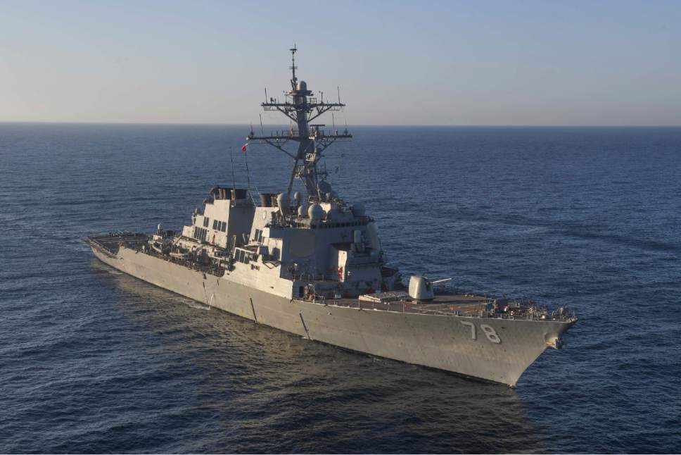 In this image provided by the U.S. Navy, the guided-missile destroyer USS Porter (DDG 78) transits the Mediterranean Sea on March 9, 2017. The United States fired a barrage of cruise missiles into Syria Thursday night in retaliation for this week's gruesome chemical weapons attack against civilians, the first direct American assault on the Syrian government and Donald Trump's most dramatic military order since becoming president.   (Mass Communication Specialist 3rd Class Ford Williams/U.S. Navy via AP)