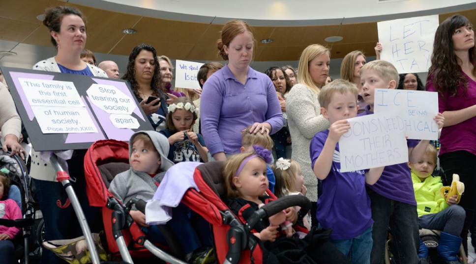 Al Hartmann  |  The Salt Lake Tribune
Mormon women and other concerned citizens gather at the Salt Lake City Airport in a show of solidarity for an area woman, Isabel, who has been ordered to leave the United States by ICE agents. 
ICE  escorted her onto a flight bound for Colombia. Isabel is a single mother and is the sole caretaker for her disabled son and her 86-year-old mother.