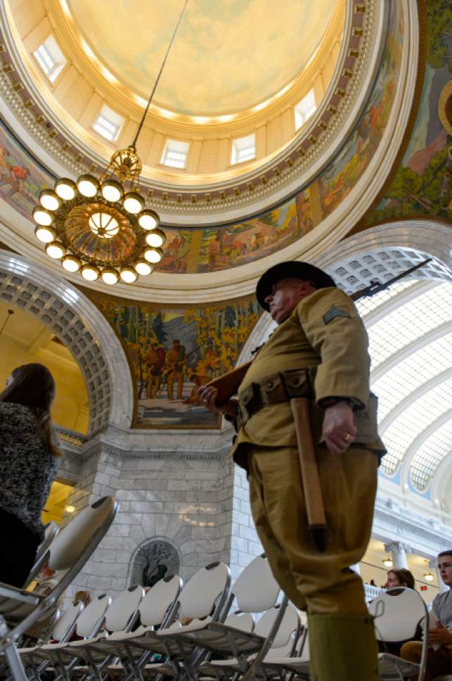 Steve Griffin  |  The Salt Lake Tribune


Dressed in a replica WWI military uniform, Chip Guarente of the Fort Douglas Military Museum, stands at attention in the Capitol Rotunda as the Department of Veterans & Military Affairs and the Utah Division of State History, hold a commemoration ceremony "Remembering the Great War." in remembrance of the 100-year anniversary of the United States entering the first world war, famously known as The Great War. Thursday, April 6, 2017.