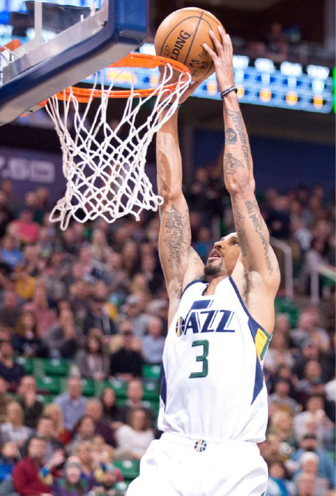 Lennie Mahler  |  The Salt Lake Tribune

George Hill dunks the ball in a game against the Memphis Grizzlies on Saturday, Jan. 28, 2017, at Vivint Smart Home Arena in Salt Lake City.