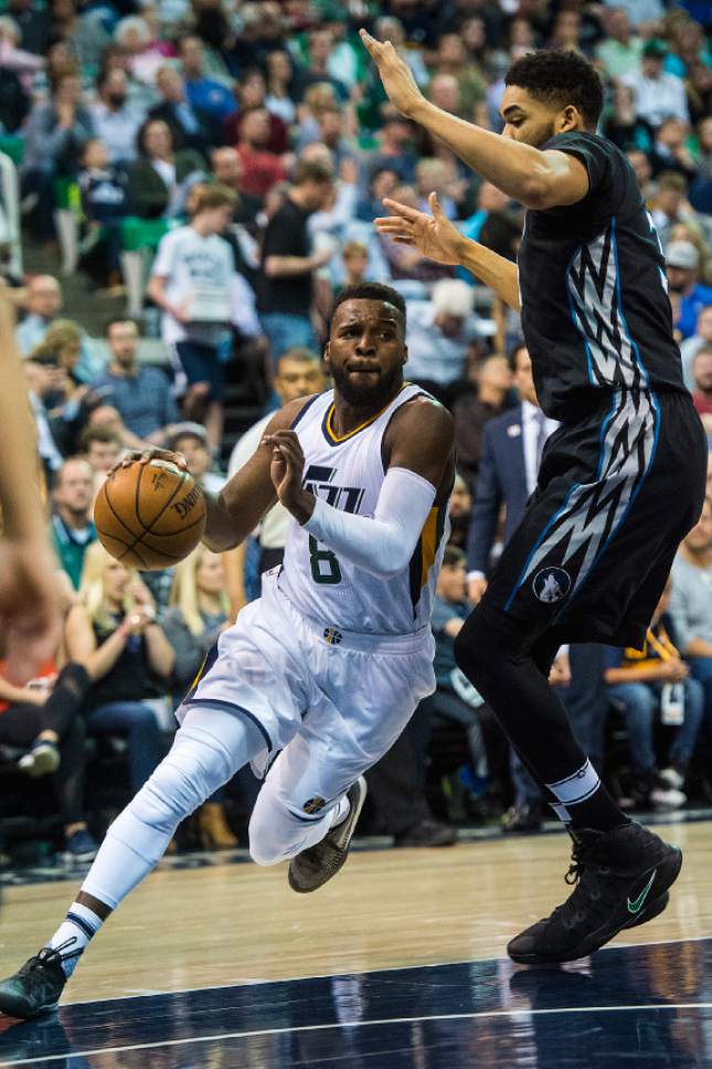 Chris Detrick  |  The Salt Lake Tribune
Utah Jazz guard Shelvin Mack (8) runs past Minnesota Timberwolves center Karl-Anthony Towns (32) during the game at Vivint Smart Home Arena Friday, April 7, 2017.