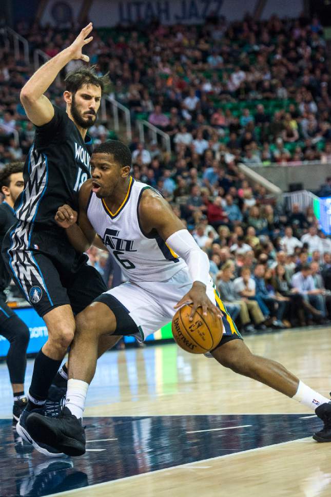 Chris Detrick  |  The Salt Lake Tribune
Utah Jazz forward Joe Johnson (6) runs past Minnesota Timberwolves forward Omri Casspi (18) during the game at Vivint Smart Home Arena Friday, April 7, 2017.