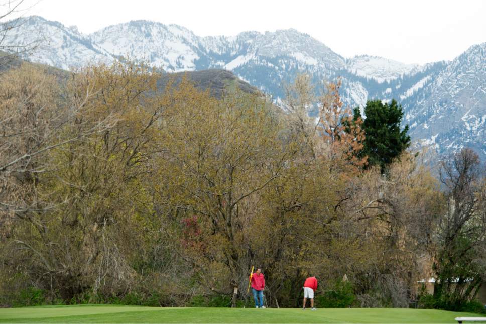 Rick Egan  |  The Salt Lake Tribune

Dan Worrell and Ward Cline play a round of golf at Bonneville Golf Course, Friday, April 7, 2017.