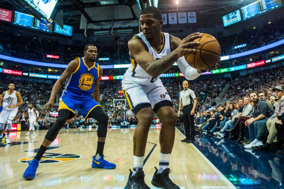 Chris Detrick  |  The Salt Lake Tribune
Utah Jazz forward Joe Johnson (6) saves the ball from going out of bounds past Golden State Warriors forward Kevin Durant (35) during the game at Vivint Smart Home Arena Thursday December 8, 2016.