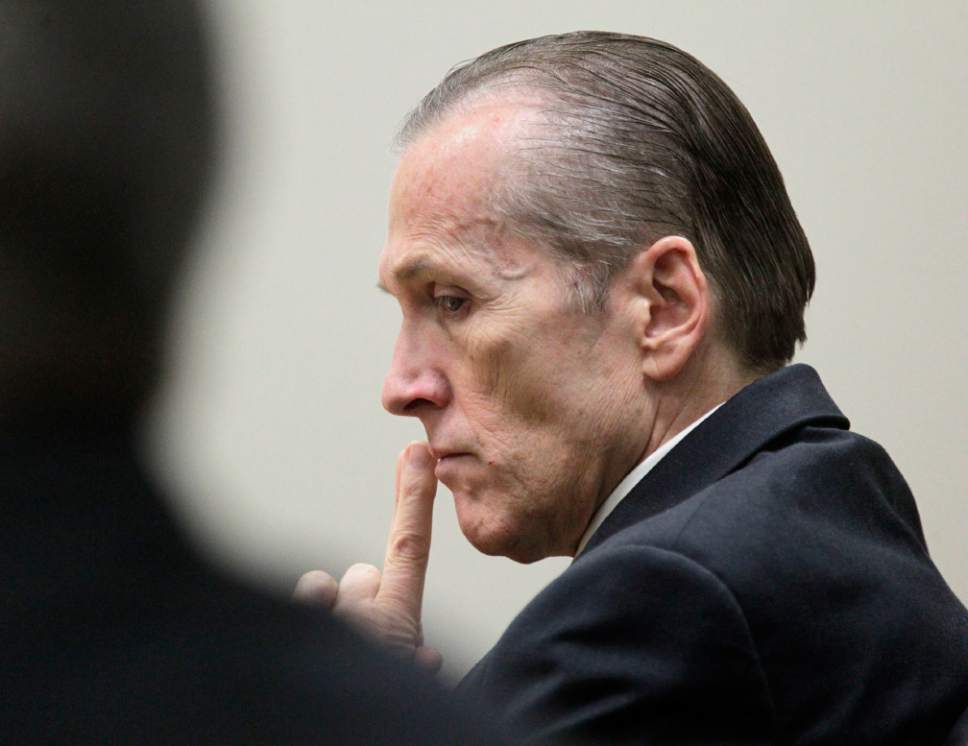 Al Hartmann  | The Salt Lake Tribune

Martin MacNeill listens to testimony of his mistress Gypsy Willis in his murder trial in 4th District Court in Provo, Utah Thursday November 7,  2013.