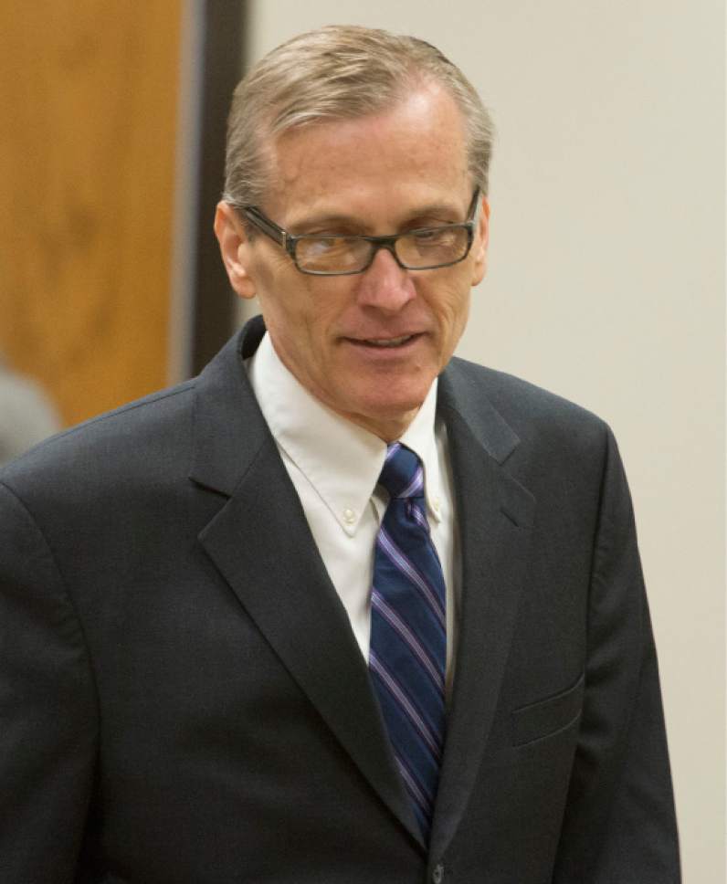 Rick Egan  |  The Salt Lake Tribune

Martin MacNeill enters the courtroom for his trial on forcible sexual abuse, Wednesday, July 2, 2014.