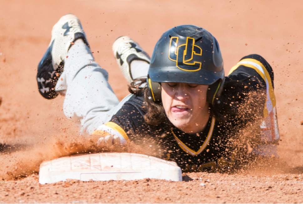 Rick Egan  |  The Salt Lake Tribune

Carter Arnold (6) Union dives back to first, in prep baseball action, Union vs Stansbury, Monday, April 10, 2017.