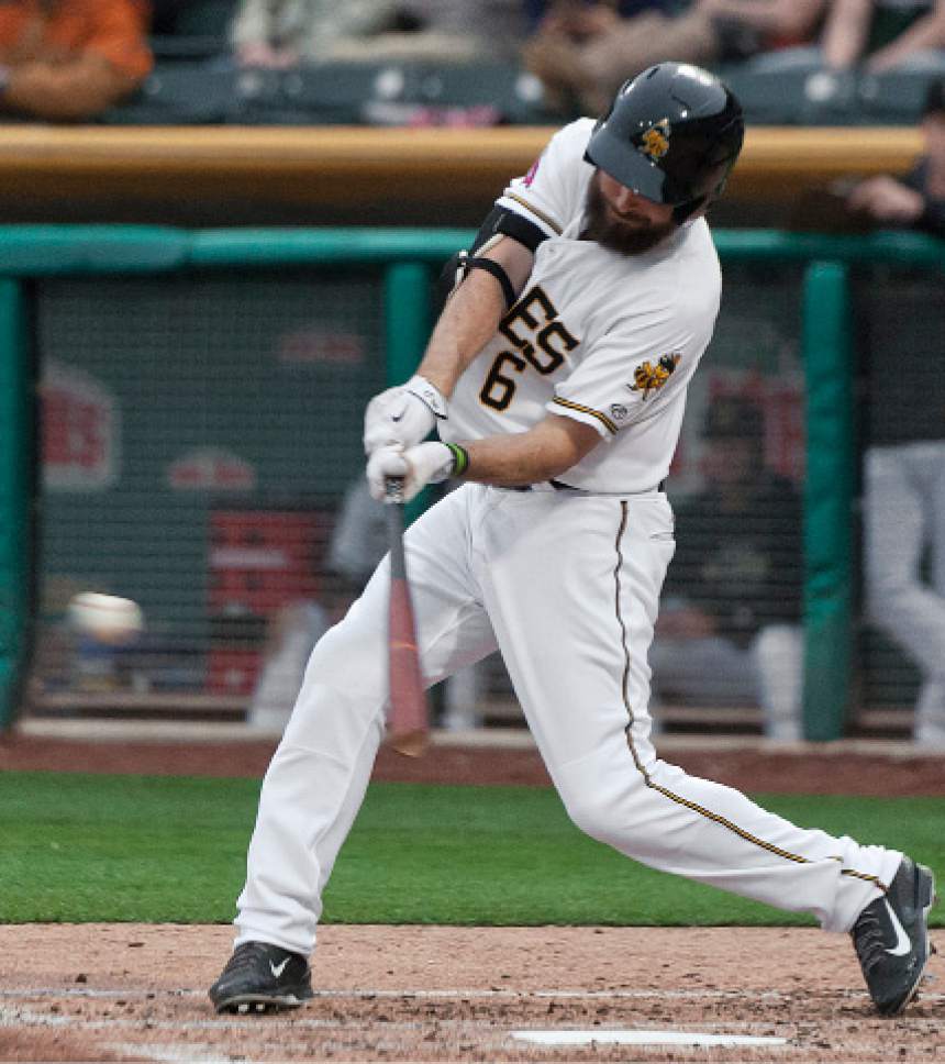 Michael Mangum  |  Special to the Tribune

Salt Lake Bees designated hitter Dustin Ackley (6) connects on a pitch during their game against the Sacramento River Cats at Smith's Ballpark on Tuesday, April 11, 2017.