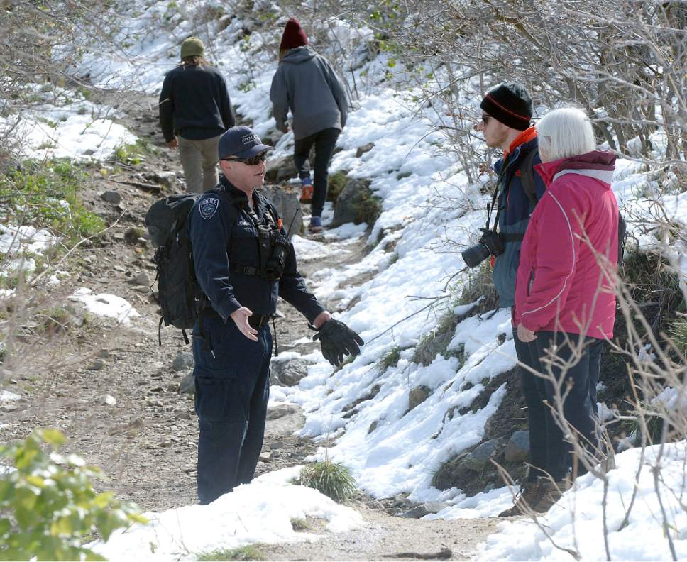 Al Hartmann  |  The Salt Lake Tribune
Mother and brother of Benjamin Kritze, 28,  join in the resumed search with Unified Police canyon patrol officer in Ferguson Canyon Monday April 10.  Kritze has been missing since Thursday on a solo hike in the mountains above Cottonwood Heights.