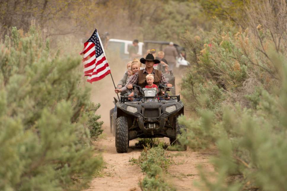 Trent Nelson  |  The Salt Lake Tribune
Ryan Bundy, son of the Nevada rancher Cliven Bundy, rides an ATV into Recapture Canyon, which has been closed to motorized use since 2007, after a call-to-action by San Juan County Commissioner Phil Lyman on Saturday, May 10, 2014, north of Blanding.
