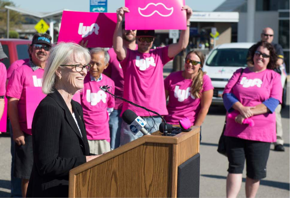 Rick Egan  |  Tribune file photo

Salt Lake City International Airport Director Maureen Riley, surrounded by Lyft drivers, announces changes to the City's airport ground transportation options at Salt Lake City International Airport, Thursday, September 10, 2015.