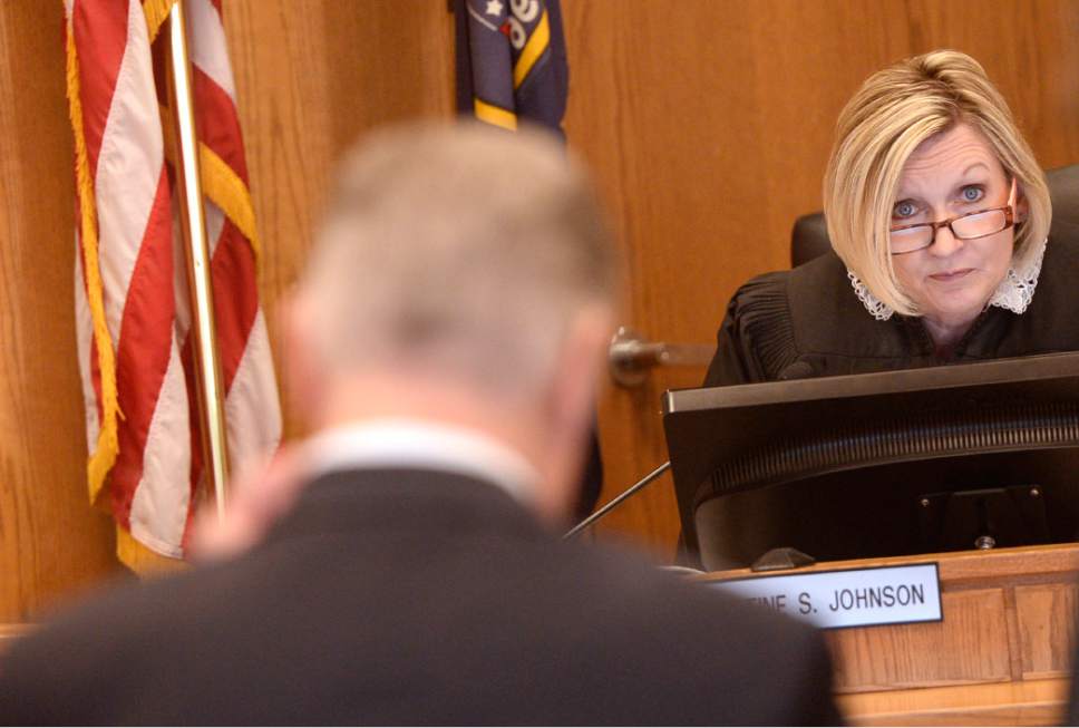 Al Hartmann  |  The Salt Lake Tribune
Defense lawyer, Mike Esplin, left, speaks for his client Luke Dollahite, 16, (not pictured) as he pleads guilty to one count of attempted aggravated murder before Judge Christine Johnson for a locker-room knife rampage last year at an Orem high school.