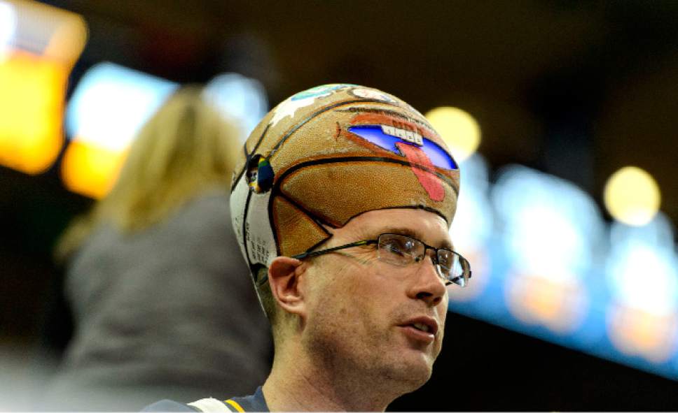 Steve Griffin  |  The Salt Lake Tribune


Jeff Profit, of Cedar Hills, cheers on the Jazz wearing a basketball on his head prior to the tip-off of the final game of the 2017 season against the San Antonio Spurs at Vivint Smart Home Arena in Salt Lake City Wednesday April 12, 2017.