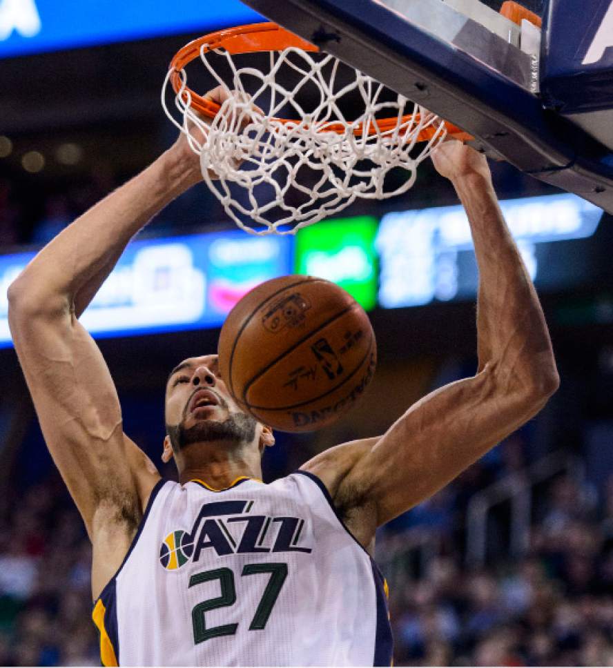 Steve Griffin  |  The Salt Lake Tribune


Utah Jazz center Rudy Gobert (27) throws down a dunk during the final game of the 2017 season against the San Antonio Spurs at Vivint Smart Home Arena in Salt Lake City Wednesday April 12, 2017.