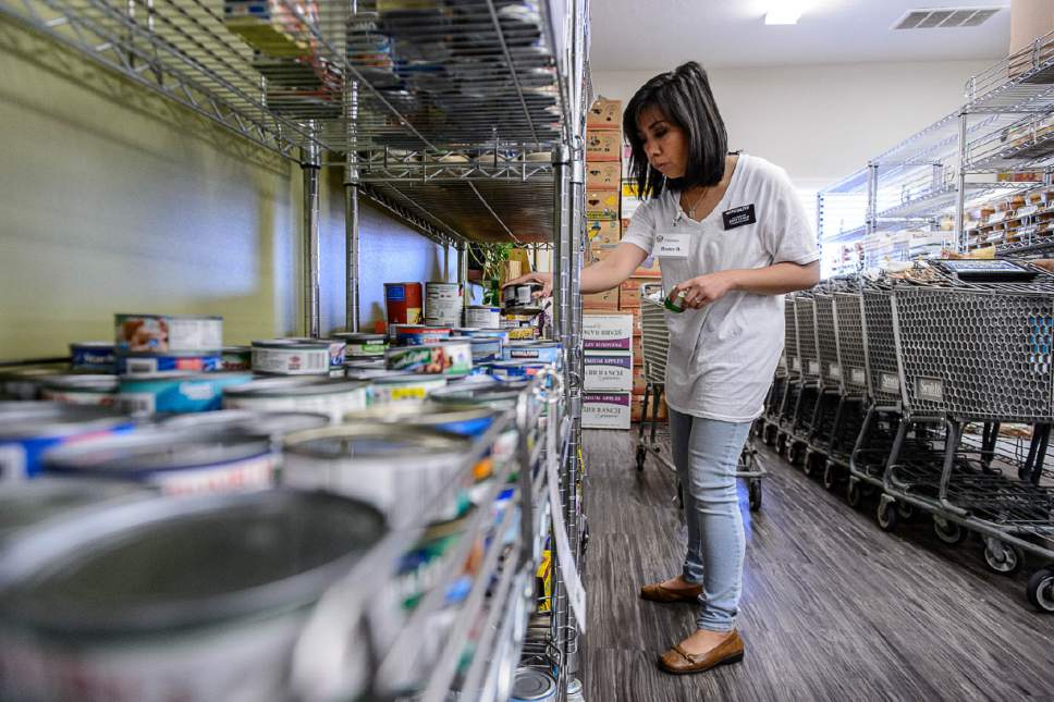 Trent Nelson  |  The Salt Lake Tribune
Valyn Baluyot, on a mission for the LDS Church, serves at the Bountiful Food Pantry, Tuesday, March 28, 2017.