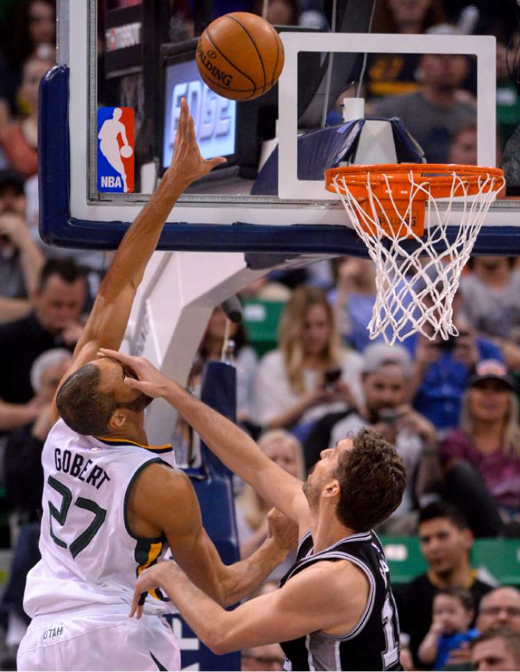 Steve Griffin  |  The Salt Lake Tribune


Utah Jazz center Rudy Gobert (27) gets smacked in the face by San Antonio Spurs center Pau Gasol (16) during the final game of the 2017 season at Vivint Smart Home Arena in Salt Lake City Wednesday April 12, 2017.