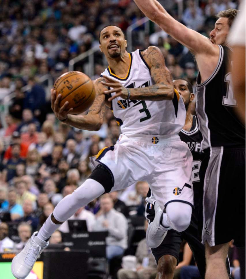 Steve Griffin  |  The Salt Lake Tribune


Utah Jazz guard George Hill (3) gets to the lane as he shoots over San Antonio Spurs guard Danny Green (14) during the final game of the 2017 season at Vivint Smart Home Arena in Salt Lake City Wednesday April 12, 2017.