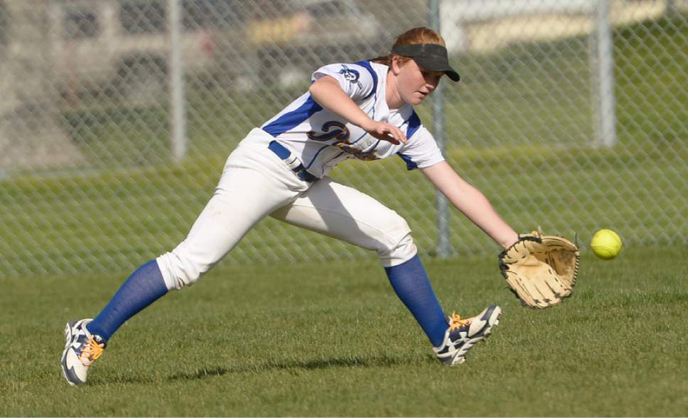 Leah Hogsten  |  The Salt Lake Tribune 
Cyprus' Chloe Sharp makes the catch.Cyprus High School girls' softball team defeated Kearns High School 5-0 during their game Thursday, April 13, 2017 in Magna.