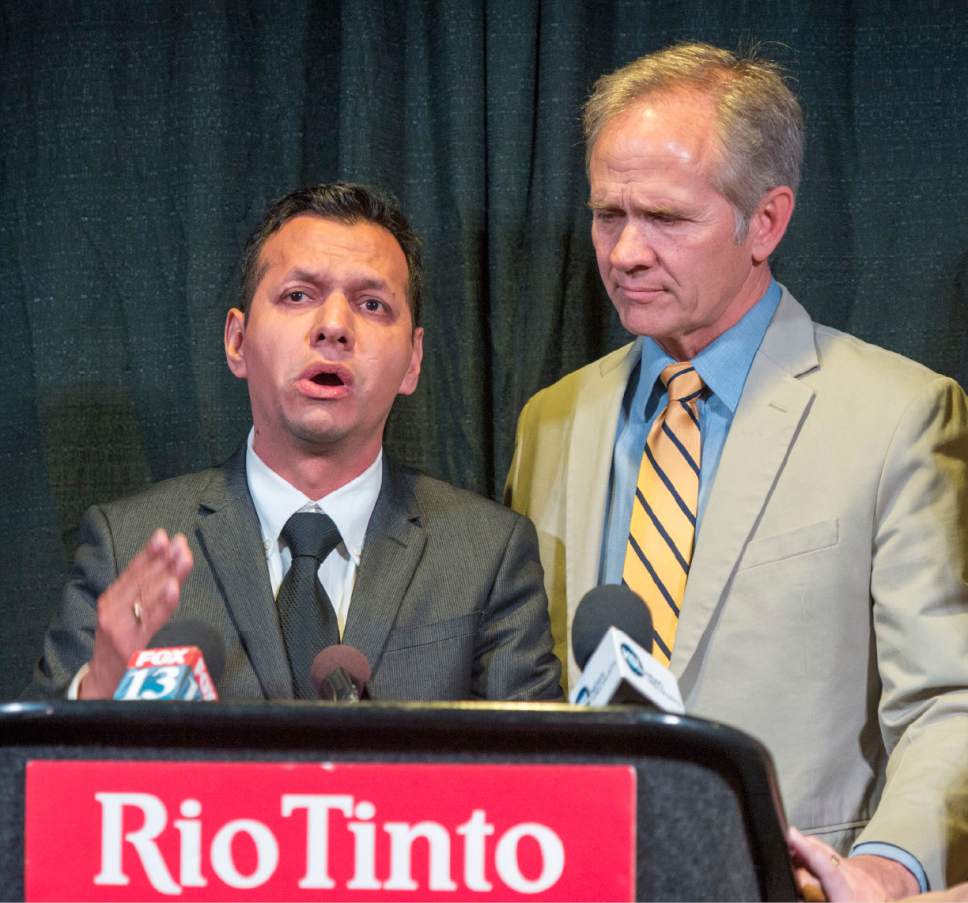 Rick Egan  |  The Salt Lake Tribune
Rosemberg Salgado stands next to Ed Smart at an April news conference as he pleads for help in the search for his niece, 26-year-old Elizabeth Elena Laguna-Salgado, who was last seen April 16.