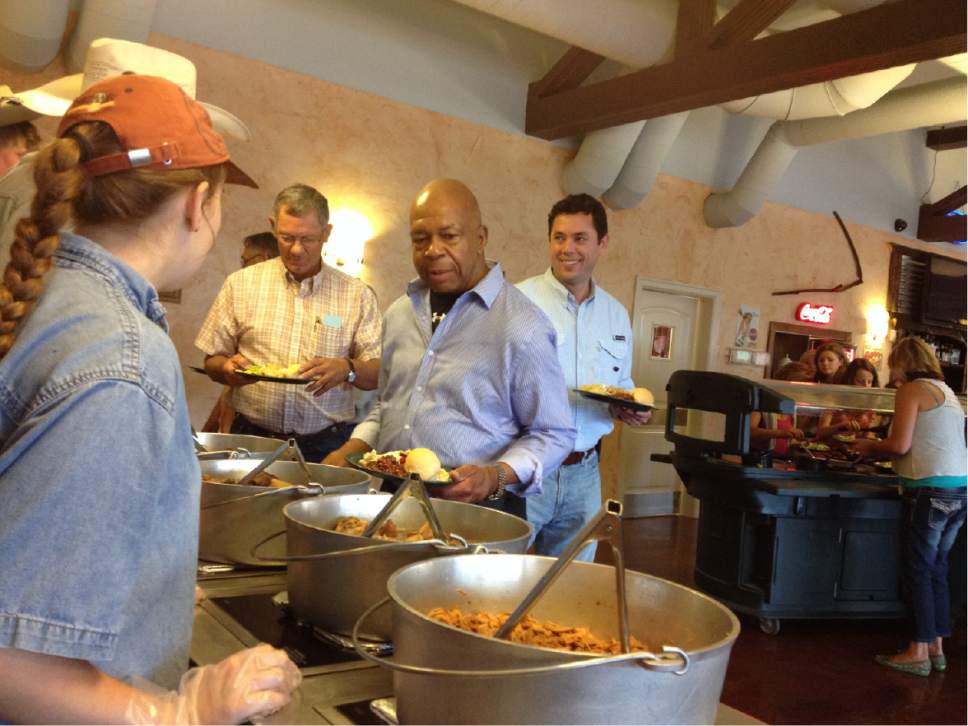 Matt Canham  |  The Salt Lake Tribune

Rep. Jason Chaffetz, R-Utah, and Rep. Elijah Cummings, D-Md., partake of a dutch oven buffet in Moab, as part of a tour meant to introduce Cummings to political issues affecting the rural West.