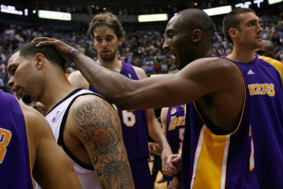 Chris Detrick  |  The Salt Lake Tribune  

Los Angeles Lakers' Kobe Bryant #24 and Utah Jazz's Deron Williams #8 after the game at the EnergySolutions Arena on May 16, 2008. The Lakers won 108-105.