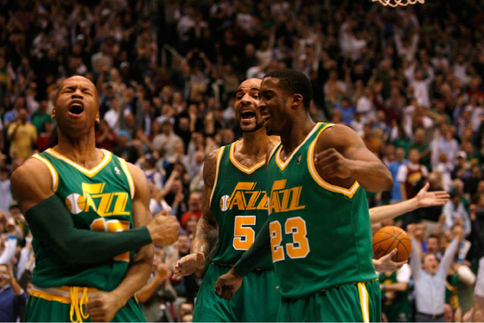 Rick Egan   |  The Salt Lake Tribune

Utah Jazz's Sundiata Gaines, Carlos Boozer, and Wesley Matthews celebrate after a big play in the 4th quarter, in NBA action Jazz vs. The Cleveland Cavaliers,  Thursday, January 14, 2010