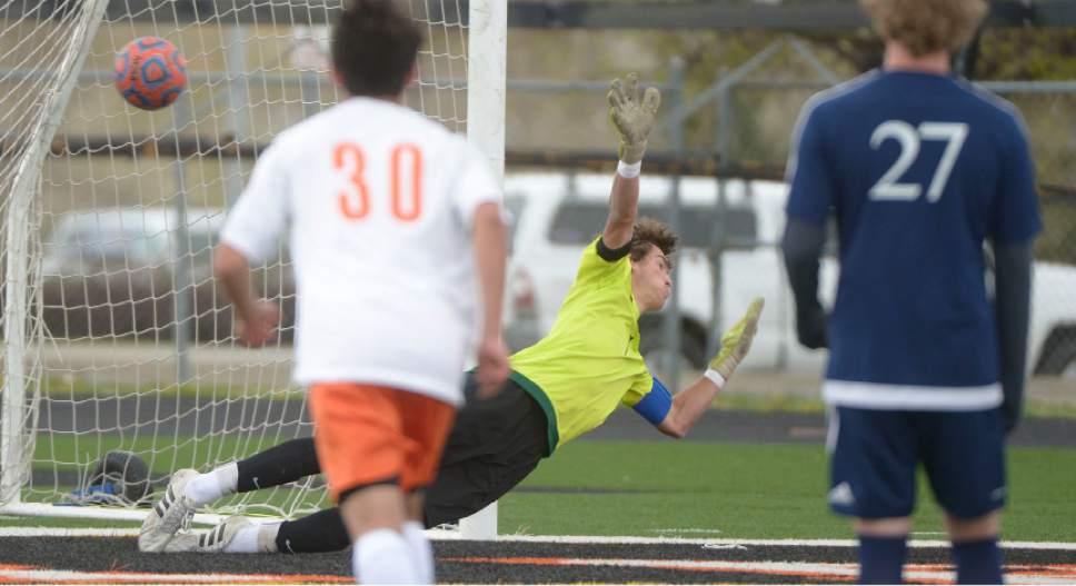 Leah Hogsten  |  The Salt Lake Tribune 
Skyline's Tommy Jensen can't make the save on Murray's Drayden Ricks' first half goal. Murray High School boys' soccer team defeated Skyline High School 3-2 in double overtime during their game at Murray, Friday, April 14, 2017