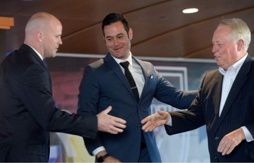 Al Hartmann  |  The Salt Lake Tribune
RSL General Manager Craig Waibel, left, and  RSL Owner Dell Loy Hansen, right,  welcome new coach Mike Petke  during a news conference Wednesday March 29 at Rio Tinto Stadium.