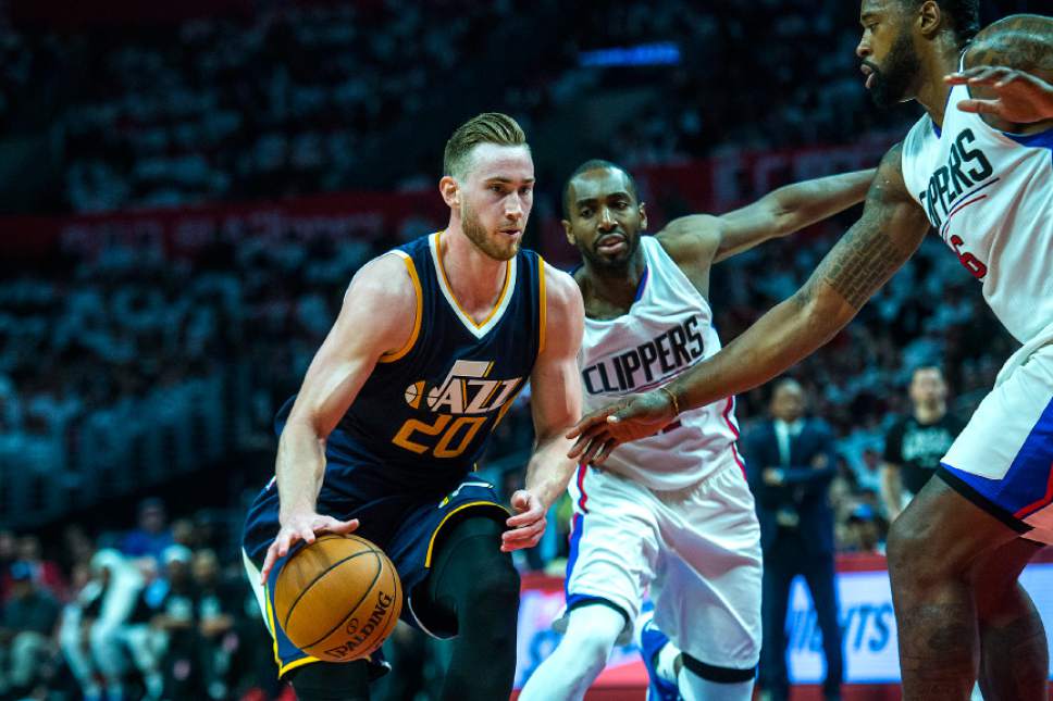 Chris Detrick  |  The Salt Lake Tribune
Utah Jazz forward Gordon Hayward (20) runs past LA Clippers forward Luc Mbah a Moute (12) and LA Clippers center DeAndre Jordan (6) during Game 1 of the Western Conference at the Staples Center Saturday, April 15, 2017.  Utah Jazz defeated LA Clippers 97-95.