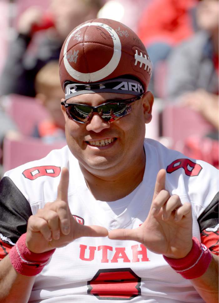 Leah Hogsten  |  The Salt Lake Tribune 
Albert Gamboa shows his support for the team. The University of Utah Utes were back in action  during the 16th-annual Red-White football game on Saturday, April 15, 2017 at  Rice-Eccles Stadium.