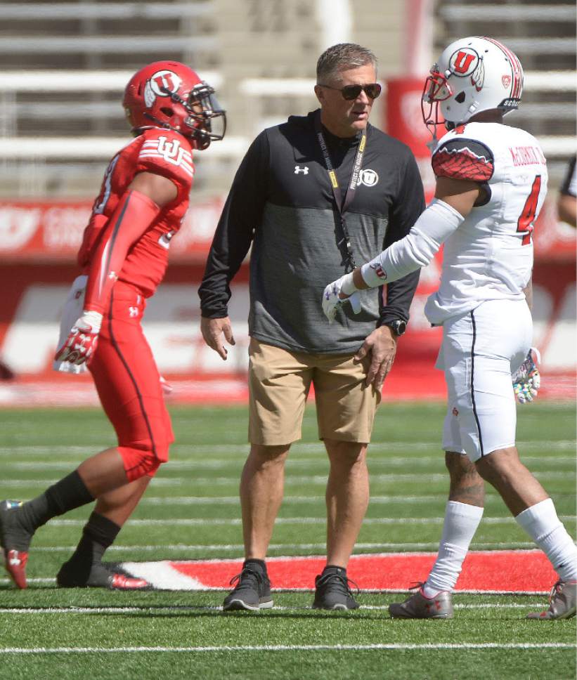 Leah Hogsten  |  The Salt Lake Tribune 
Utes head coach Kyle Whittingham oversees the game from the center of the field. The University of Utah Utes were back in action  during the 16th-annual Red-White football game on Saturday, April 15, 2017 at  Rice-Eccles Stadium.