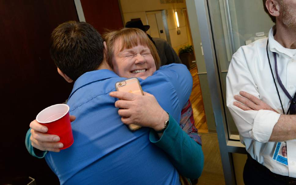 Francisco Kjolseth | The Salt Lake Tribune
Managing Editor Sheila McCann gets a hug from Senior Managing Editor Matt Canham as The Salt Lake Tribune wins its second Pulitzer Prize in its nearly 150-year history Monday, earning the nod in local reporting for its groundbreaking investigation of rape at Utah colleges.