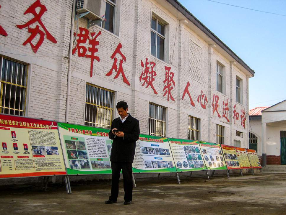 Tony Semerad | The Salt Lake Tribune
Government messages are emblazoned across the side of an elementary school in the tiny village of Mayao in east-central China's Henan province. Apart from the singing of students inside, though, Mayao was quiet and largely empty during a visit in late February.