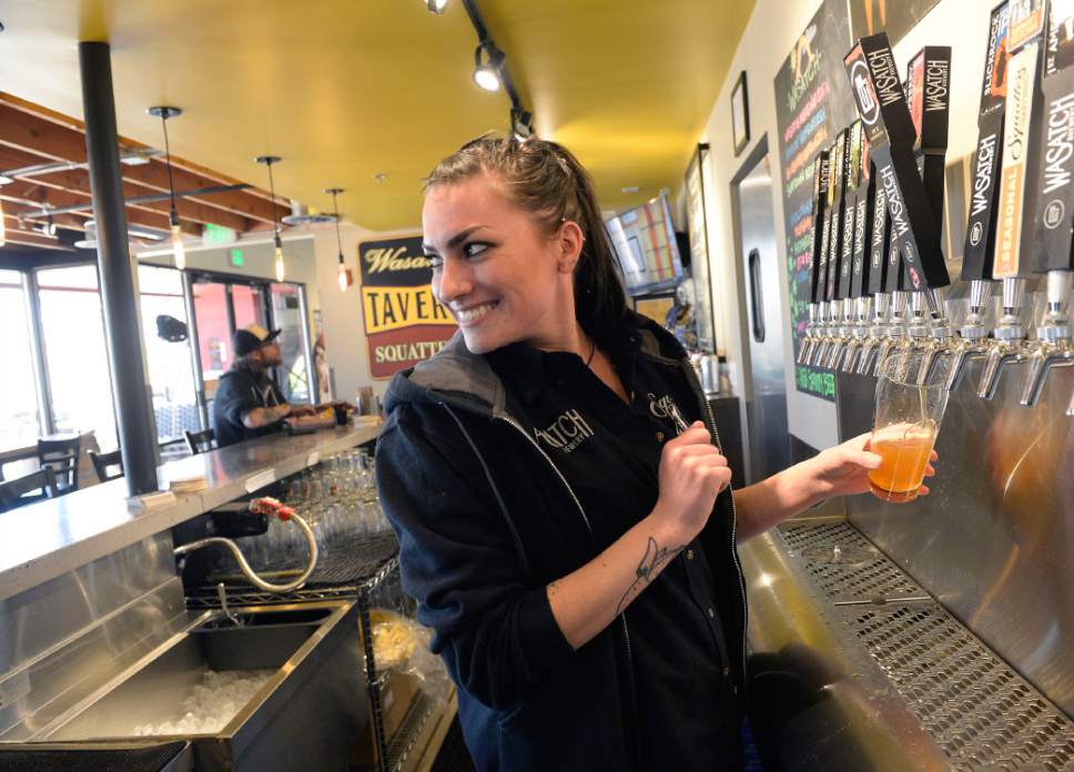 Al Hartmann  |  The Salt Lake Tribune
Bartender Jordan Gonzales pours a cold beer for a lunch customer at the West Side Tavern, a new bar that has opened as part of the Wasatch/Squatters Beer Store at 1763 W. 300 South in Salt Lake City.