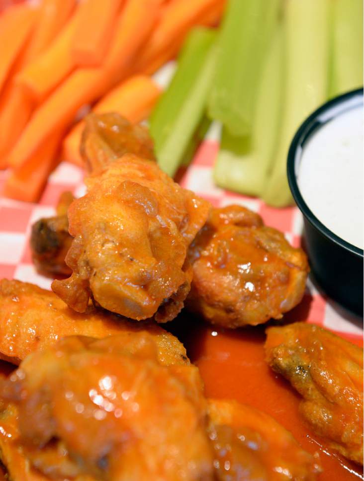 Al Hartmann  |  The Salt Lake Tribune
Squatters' Legendary Buffalo Wings from West Side Tavern, a new bar that has opened as part of the Wasatch/Squatters Beer Store at 1763 W. 300 South in Salt Lake City.