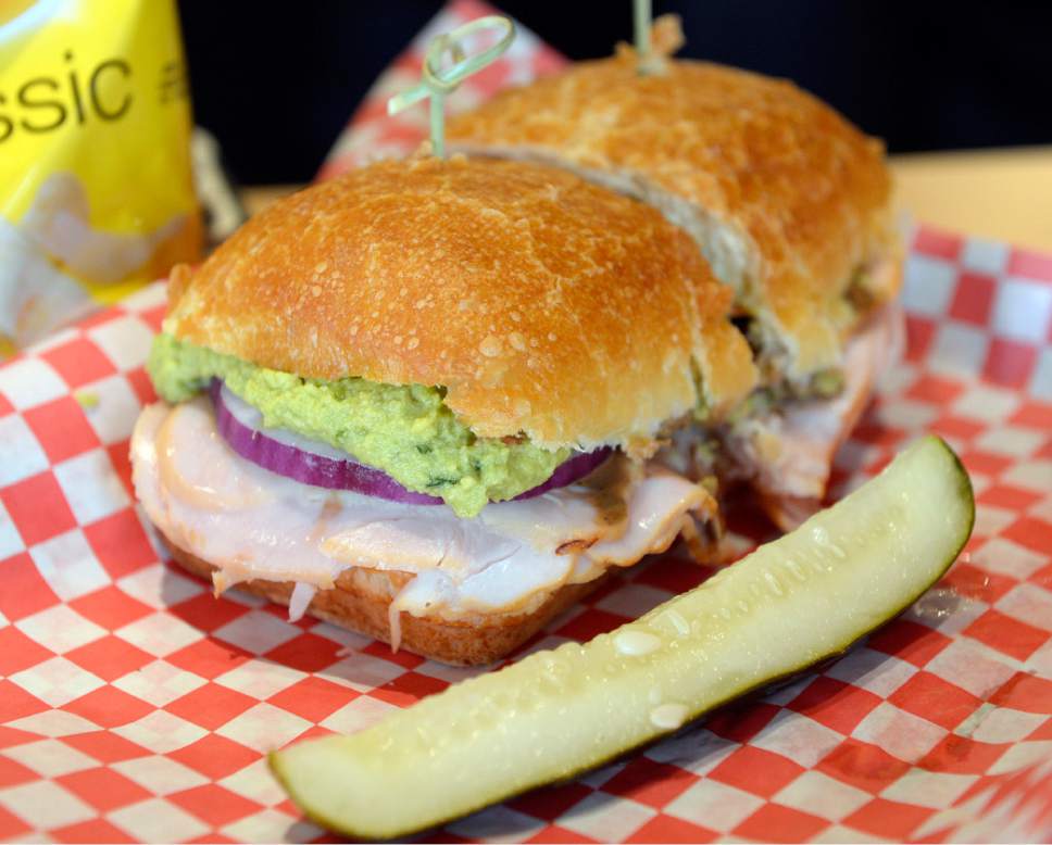 Al Hartmann  |  The Salt Lake Tribune
Turkey and Guac sandwich with lettuce, tomato, red onion, swiss, balsamic vinaigrette on ciabata at West Side Tavern, a new bar that has opened as part of the Wasatch/Squatters Beer Store at 1763 W. 300 South in Salt Lake City.