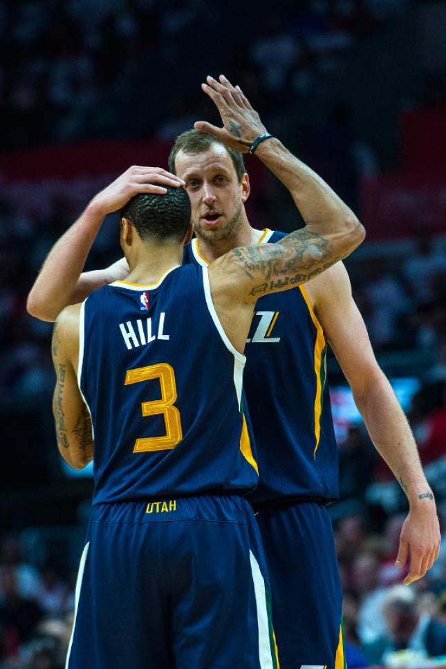 Chris Detrick  |  The Salt Lake Tribune
Utah Jazz guard George Hill (3) and Utah Jazz forward Joe Ingles (2) embrace during Game 1 of the Western Conference at the Staples Center Saturday, April 15, 2017.  Utah Jazz defeated LA Clippers 97-95.