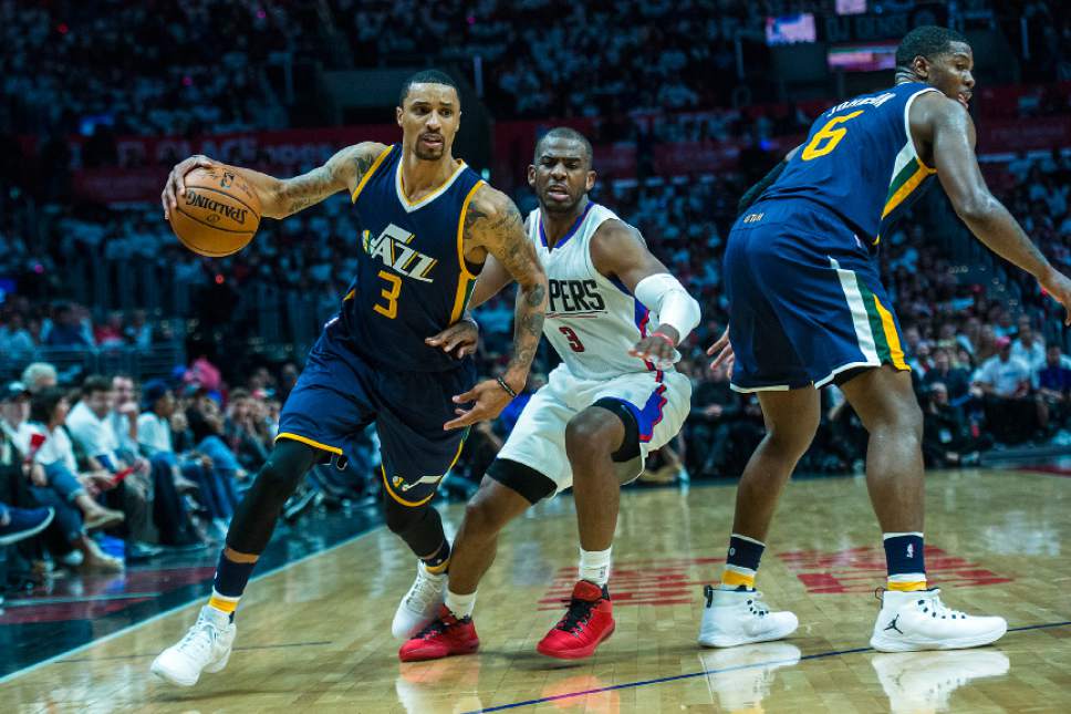 Chris Detrick  |  The Salt Lake Tribune
Utah Jazz guard George Hill (3) runs around LA Clippers guard Chris Paul (3) during Game 1 of the Western Conference at the Staples Center Saturday, April 15, 2017.  Utah Jazz defeated LA Clippers 97-95.