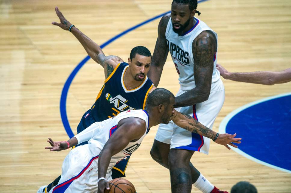 Chris Detrick  |  The Salt Lake Tribune
Utah Jazz guard George Hill (3) guards LA Clippers guard Chris Paul (3) during Game 1 of the Western Conference at the Staples Center Saturday, April 15, 2017.