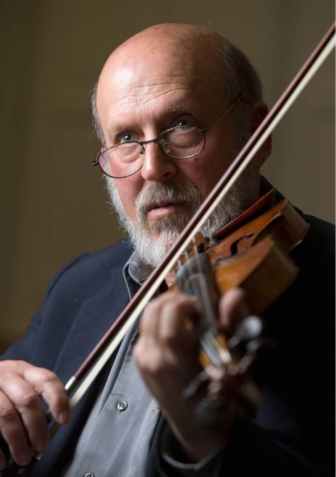 Leah Hogsten  |  The Salt Lake Tribune 
Violinist Gerald Elias practices for an upcoming trio performance at Libby Gardner Hall with violist Joel Rosenberg and pianist Jeffrey Price.